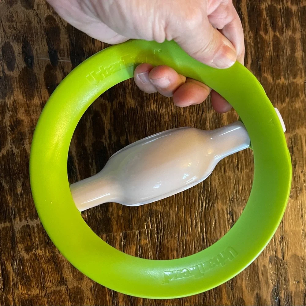 Green and White Rolling Herb Cutter